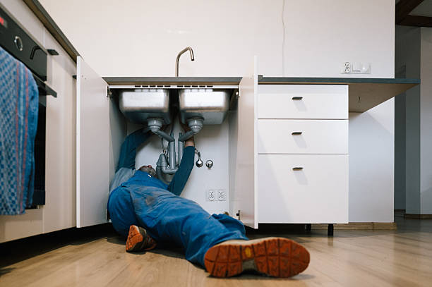 Professional Emergency Plumber technician working in Bogota, NJ